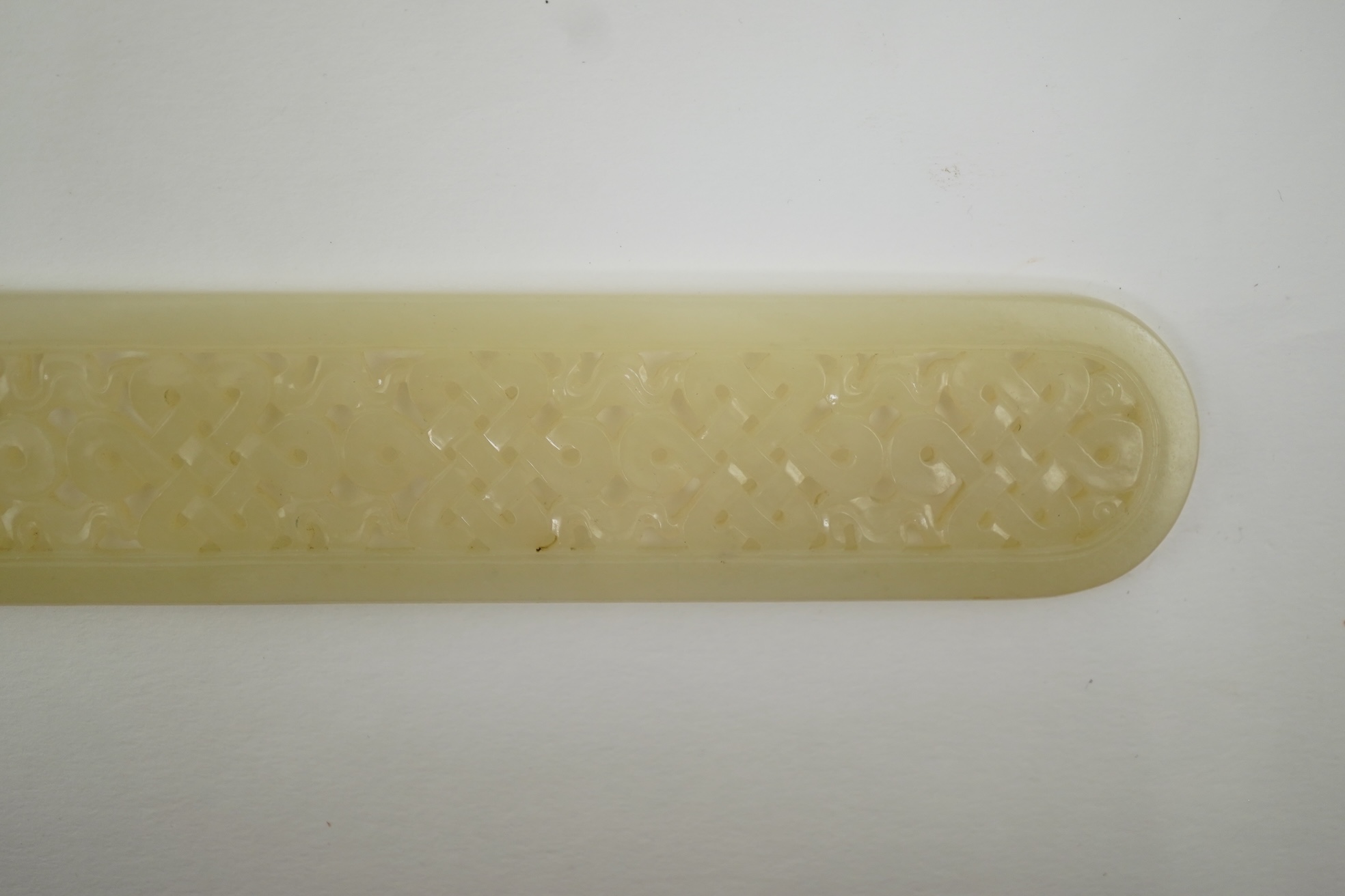 A Chinese pale celadon jade scroll weight